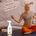 Gleamsure room freshener next to a woman meditating on the floor, highlighting the product as a ‘Mood Enhancer