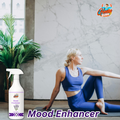 Gleamsure room freshener next to a woman meditating on the floor, highlighting the product as a ‘Mood Enhancer’