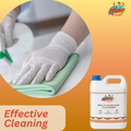 Gloved hand cleaning a wooden surface with GleamSure cleaner, emphasizing 'Effective Cleaning