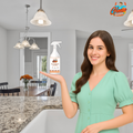 Young_woman_holding_Gleamsure_Multipurpose_Cleaner_bottle_in_hand_smiling